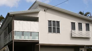 Renovated two storey house with extensions.